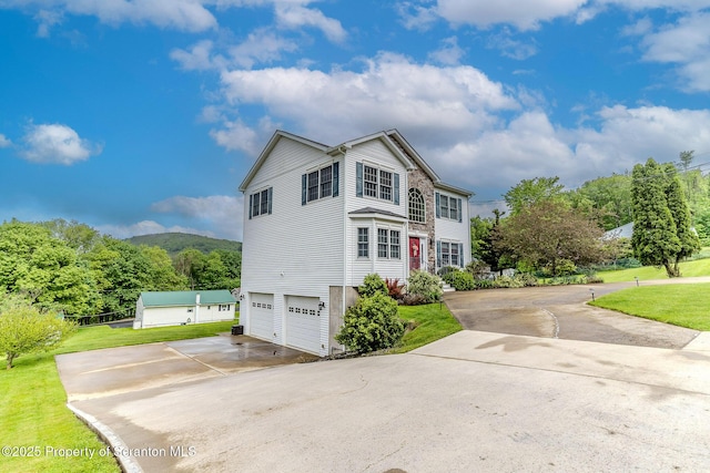 99 Elizabeth Ave, Hallstead, PA 18822 - view of front of house featuring an attached garage, a front yard, and driveway