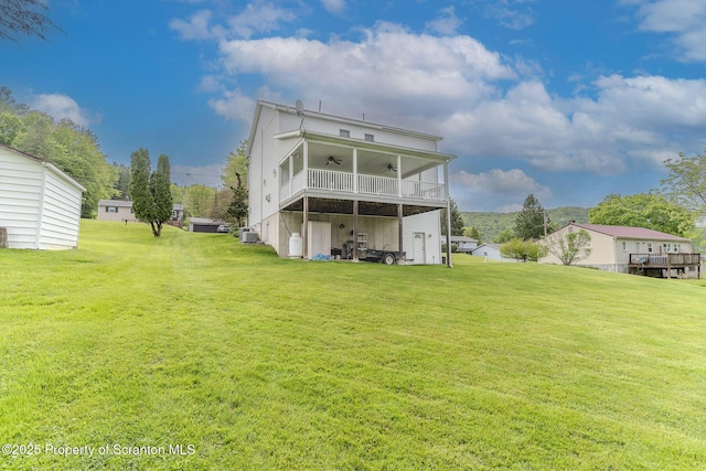 99 Elizabeth Ave, Hallstead, PA 18822 - rear view of house with a ceiling fan, a yard, and central air condition unit
