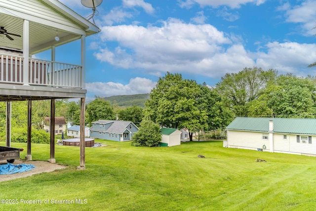 99 Elizabeth Ave, Hallstead, PA 18822 - view of grassy yard featuring ceiling fan and a mountain view