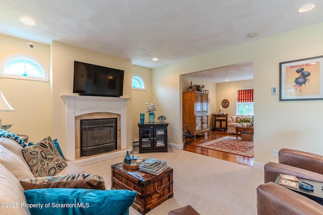 99 Elizabeth Ave, Hallstead, PA 18822 - carpeted living area featuring a fireplace, recessed lighting, and baseboards