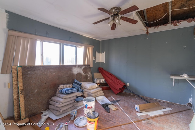 miscellaneous room featuring ceiling fan