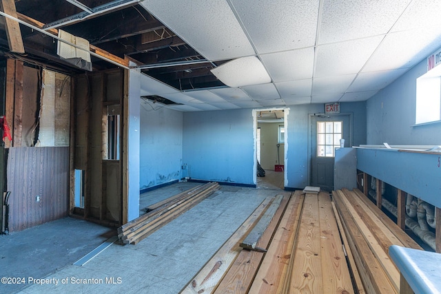 interior space with a drop ceiling