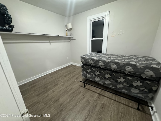 bedroom featuring dark hardwood / wood-style floors