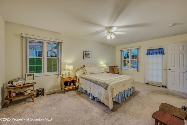 8 Parkland Dr Bldg 9, South Abington Twp, PA 18411 - carpeted bedroom with baseboards and a ceiling fan