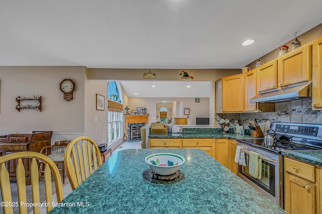8 Parkland Dr Bldg 9, South Abington Twp, PA 18411 - kitchen with stainless steel electric range oven, under cabinet range hood, a fireplace, decorative backsplash, and recessed lighting