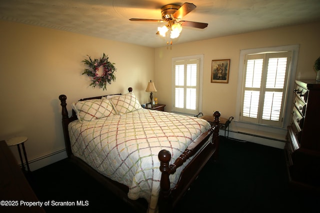 938 Oak St, Scranton, PA 18508 - bedroom with a baseboard heating unit and ceiling fan