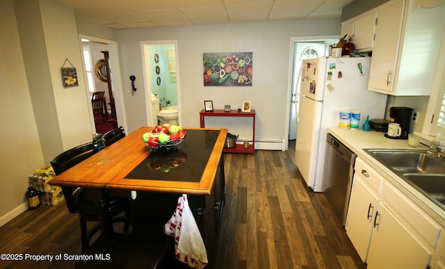 938 Oak St, Scranton, PA 18508 - kitchen with stainless steel dishwasher, a drop ceiling, dark wood-style floors, white cabinets, and light countertops