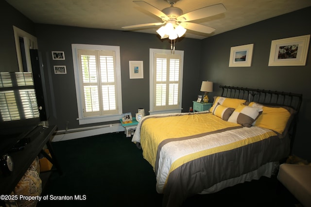 938 Oak St, Scranton, PA 18508 - bedroom featuring baseboard heating, carpet flooring, and a ceiling fan