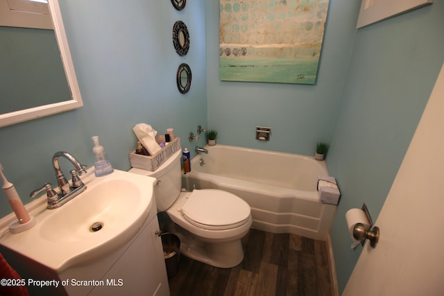 938 Oak St, Scranton, PA 18508 - bathroom with a garden tub, wood finished floors, and vanity