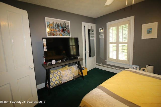 938 Oak St, Scranton, PA 18508 - bedroom featuring dark carpet and baseboards