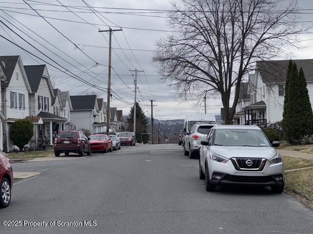 view of street featuring a residential view