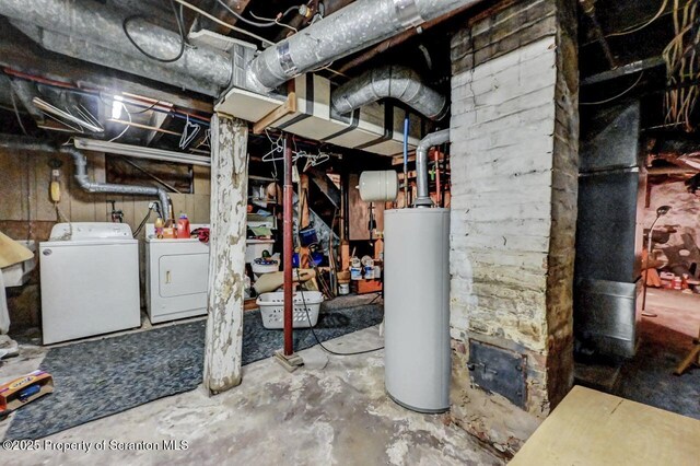 405 Dudley St, Dunmore, PA 18512 - unfinished below grade area with water heater and washing machine and dryer