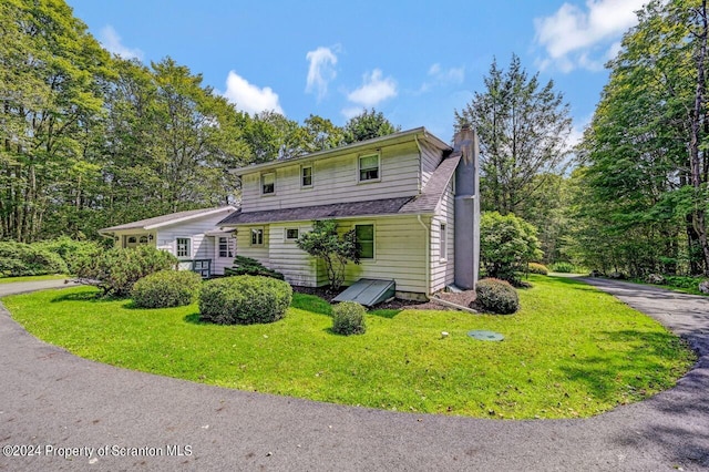 view of front of house with a front yard