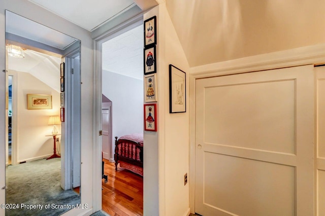 corridor featuring carpet flooring