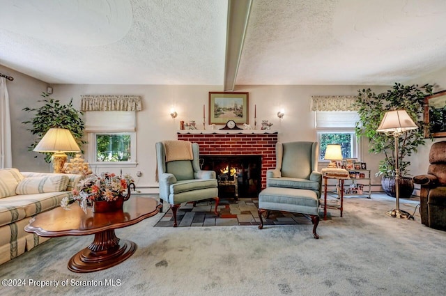 living room featuring a fireplace, a textured ceiling, baseboard heating, beamed ceiling, and carpet floors