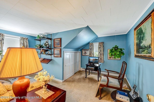 living area with a healthy amount of sunlight, crown molding, and light colored carpet