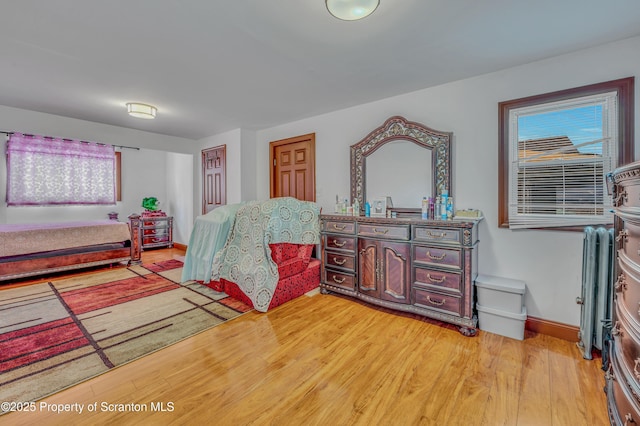 bedroom featuring light hardwood / wood-style flooring