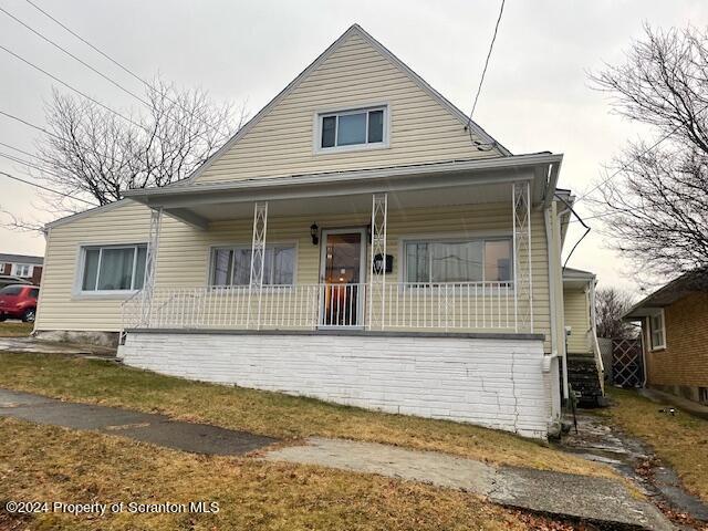 bungalow-style home with covered porch