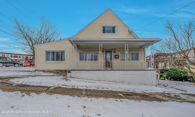 bungalow-style home featuring covered porch