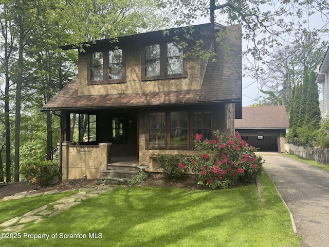 113 Claremont Ave, Clarks Summit, PA 18411 - view of front of house with a front yard, roof with shingles, and driveway