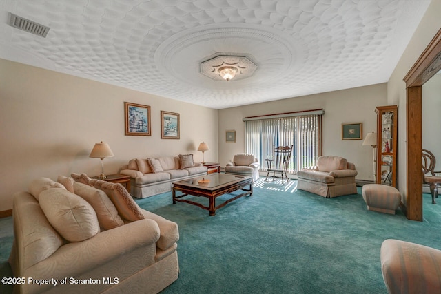 living area featuring carpet and visible vents