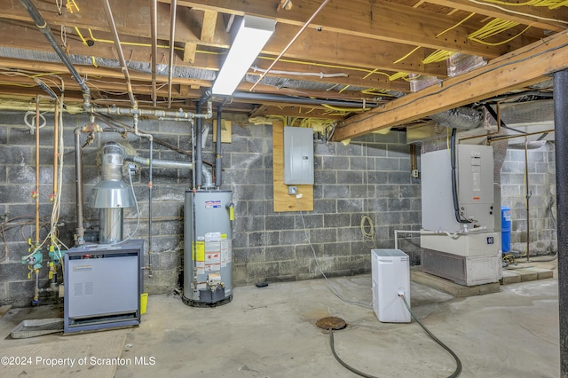 basement with electric panel, heating unit, and water heater