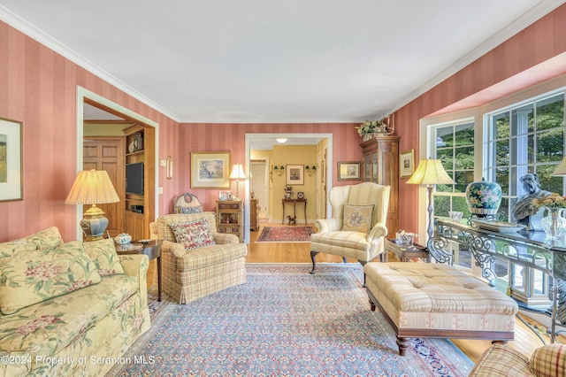 living room featuring crown molding