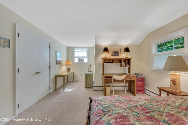 carpeted bedroom featuring cooling unit, vaulted ceiling, and a baseboard radiator