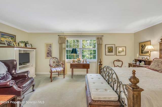 bedroom featuring light colored carpet and ornamental molding