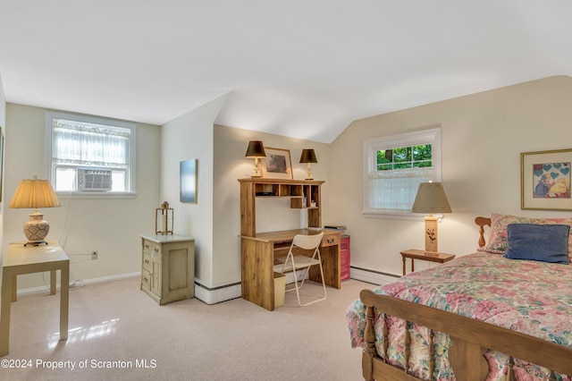 bedroom featuring light colored carpet, vaulted ceiling, and a baseboard heating unit