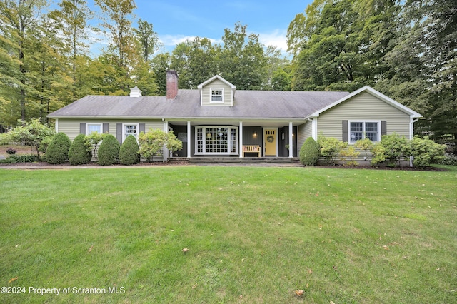 view of front of house featuring a front lawn and a porch