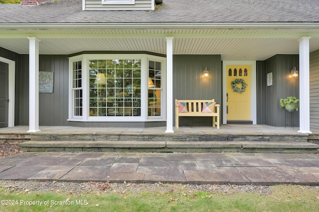 entrance to property with covered porch