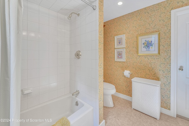 bathroom with tile patterned flooring, toilet, and shower / tub combo