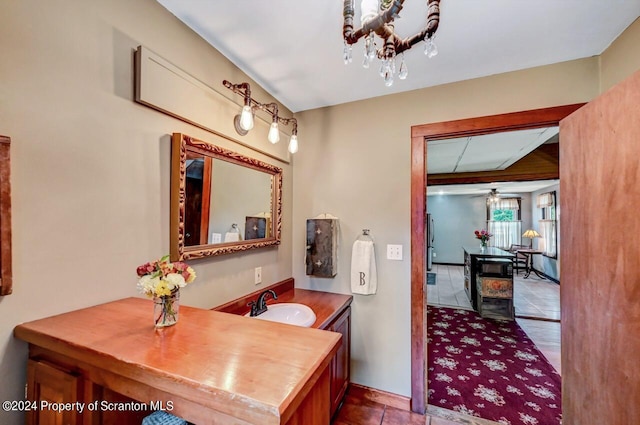 bathroom with vanity, tile patterned floors, and ceiling fan