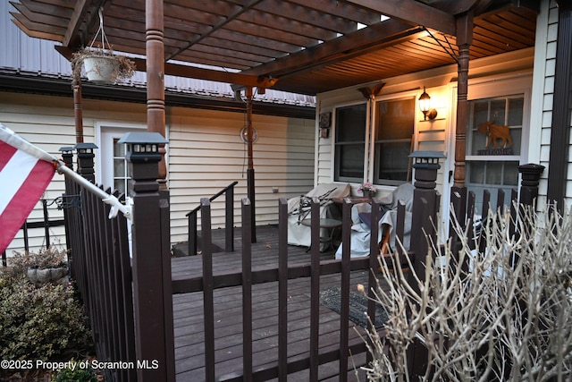 wooden deck with a pergola