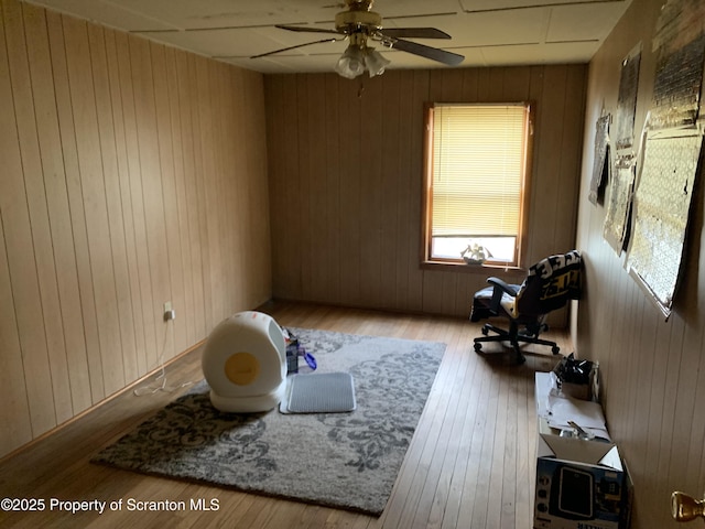 miscellaneous room featuring hardwood / wood-style floors and a ceiling fan