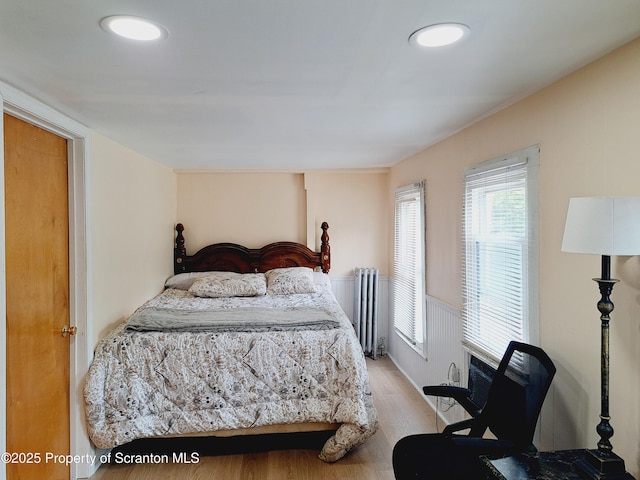 2127 Price St, Scranton, PA 18504 - bedroom featuring radiator, light wood-style flooring, and recessed lighting