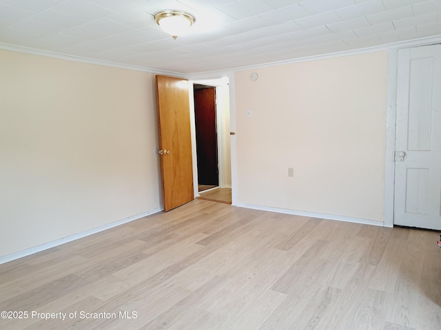 2127 Price St, Scranton, PA 18504 - unfurnished room with crown molding and light wood-style floors