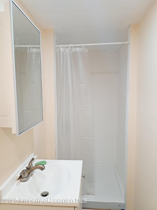 2127 Price St, Scranton, PA 18504 - bathroom featuring a stall shower and vanity