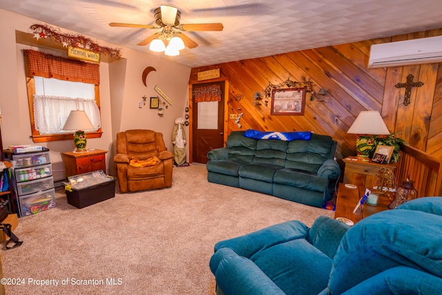 carpeted living room featuring ceiling fan, a textured ceiling, a wall mounted AC, and wood walls