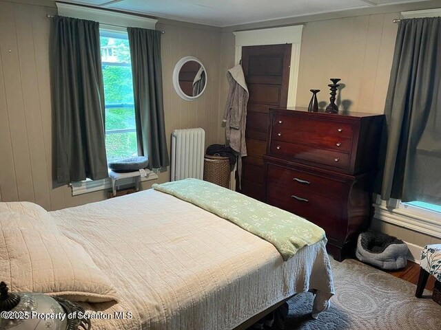 121 Burcher Ave, South Abington Twp, PA 18411 - bedroom with radiator, crown molding, and wood finished floors