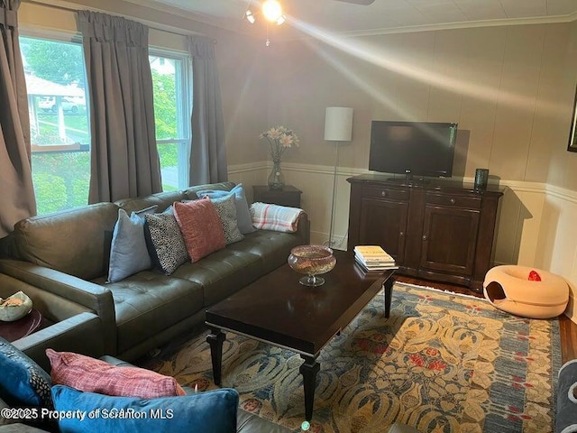 121 Burcher Ave, South Abington Twp, PA 18411 - living room with a decorative wall, crown molding, and a wainscoted wall