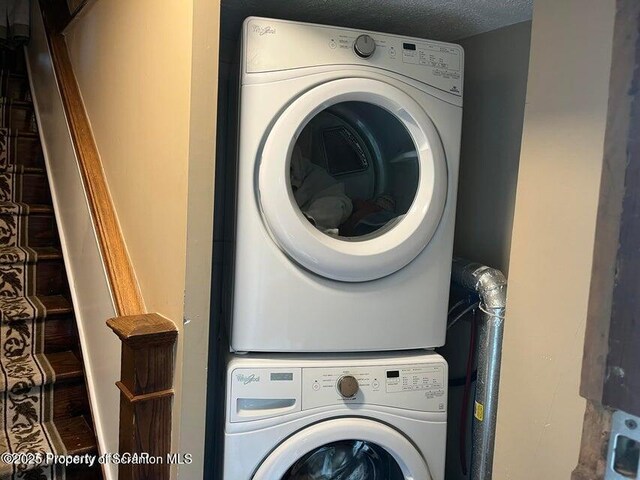 121 Burcher Ave, South Abington Twp, PA 18411 - laundry area with stacked washer / drying machine