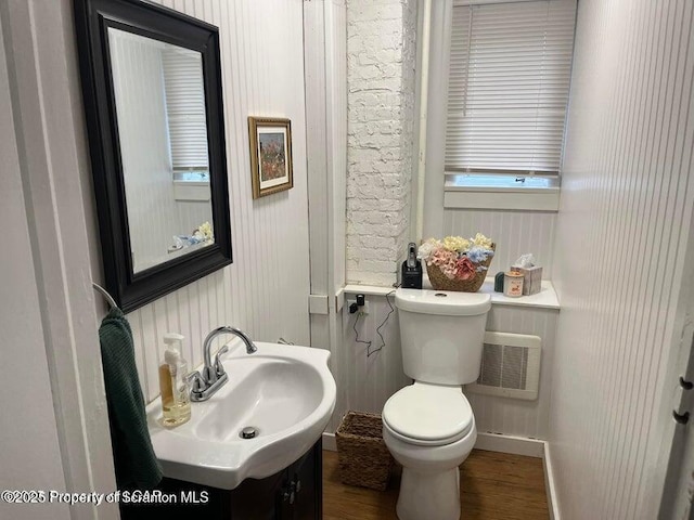 121 Burcher Ave, South Abington Twp, PA 18411 - half bath with wood finished floors, toilet, vanity, and baseboards