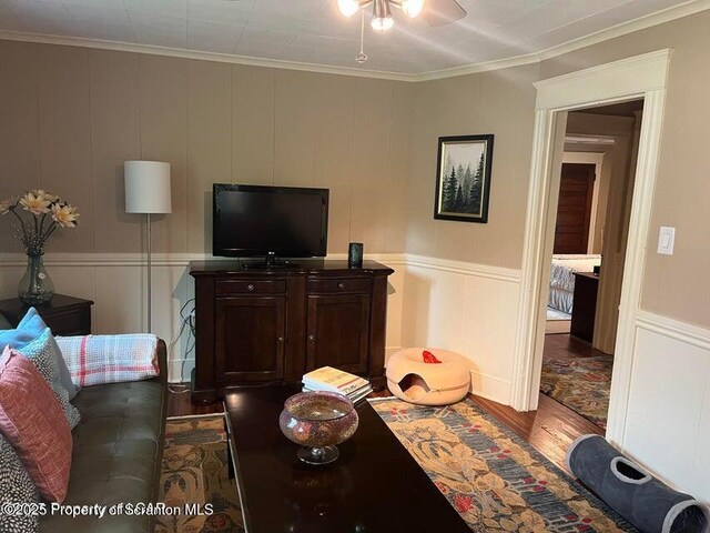 121 Burcher Ave, South Abington Twp, PA 18411 - living room with a decorative wall, wood finished floors, ceiling fan, and crown molding