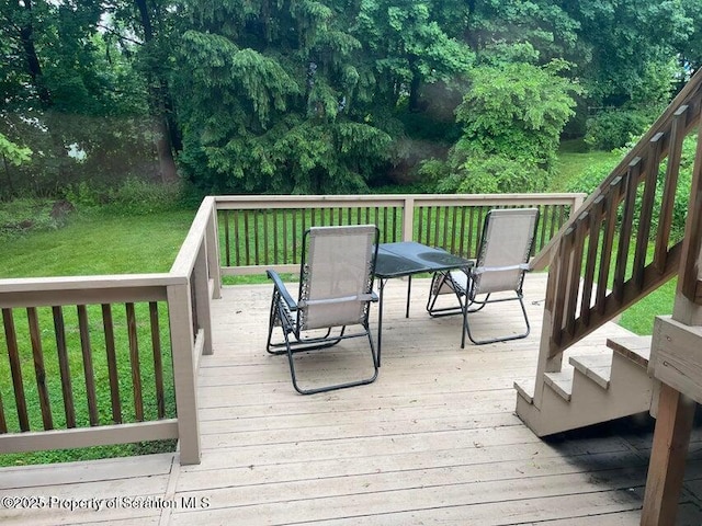 121 Burcher Ave, South Abington Twp, PA 18411 - wooden terrace featuring outdoor dining space and a lawn