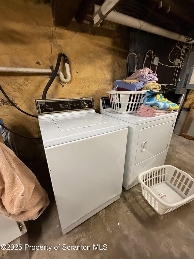 laundry area featuring washer and dryer and electric panel