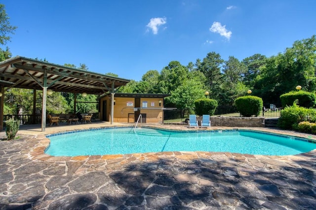 view of pool featuring a patio area