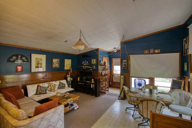 carpeted living room featuring lofted ceiling