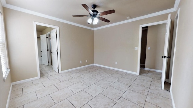 empty room featuring ceiling fan, crown molding, and light tile floors